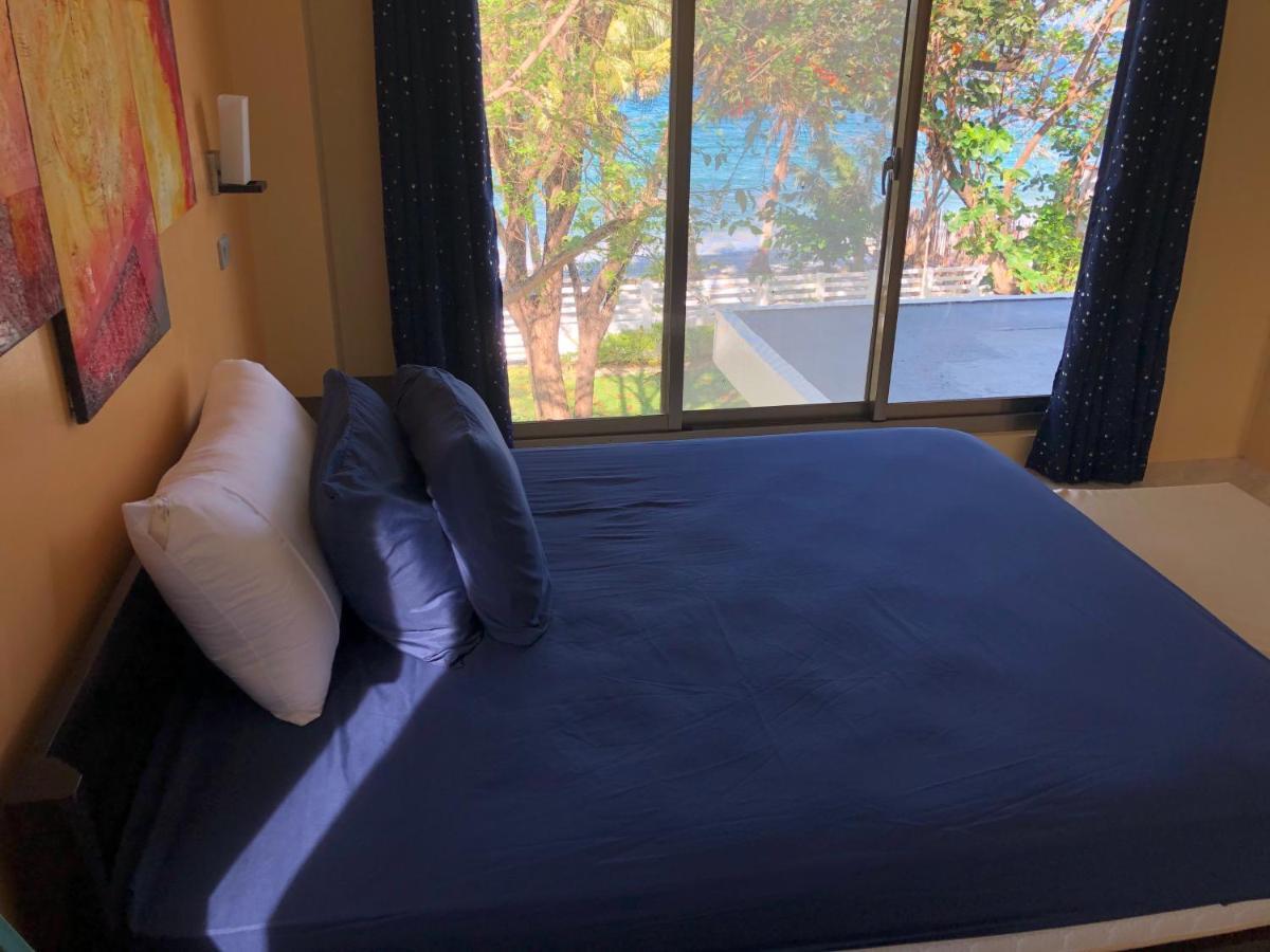 פוארטו גאלרה Amami Beachfront Villa With Private Beach מראה חיצוני תמונה