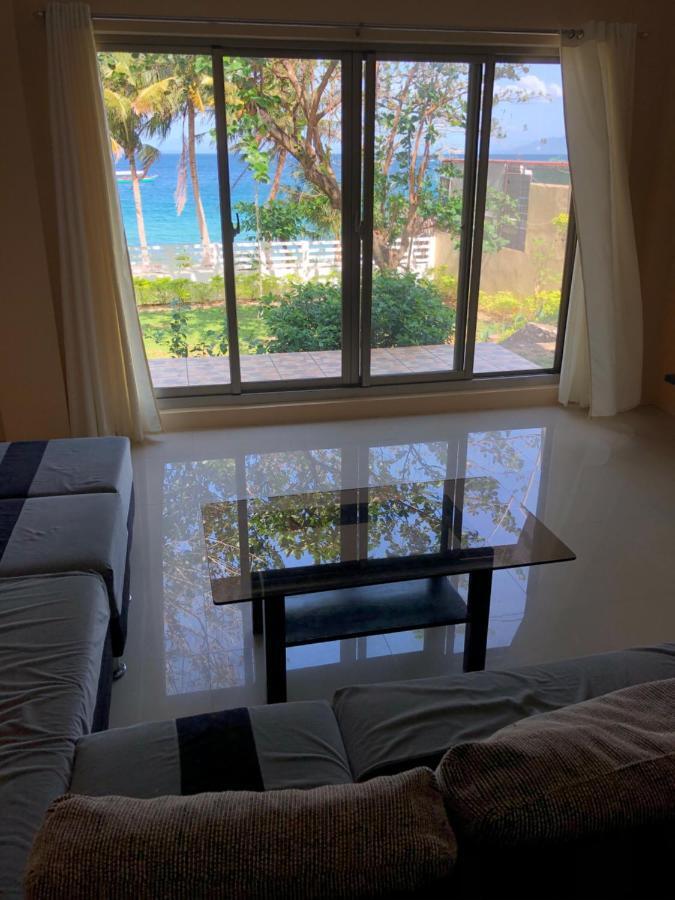 פוארטו גאלרה Amami Beachfront Villa With Private Beach מראה חיצוני תמונה